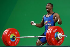 RIO DE JANEIRO, BRAZIL - AUGUST 08:  Oscar Albeiro Figueroa Mosquera of Colombia reacts during the Men's 62kg Group A weightlifting contest on Day 3 of the Rio 2016 Olympic Games at the Riocentro - Pavilion 2 on August 8, 2016 in Rio de Janeiro, Bra  (Photo by Lars Baron/Getty Images)