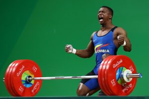 RIO DE JANEIRO, BRAZIL - AUGUST 08: Oscar Albeiro Figueroa Mosquera of Colombia reacts during the Men's 62kg Group A weightlifting contest on Day 3 of the Rio 2016 Olympic Games at the Riocentro - Pavilion 2 on August 8, 2016 in Rio de Janeiro, Bra (Photo by Lars Baron/Getty Images)